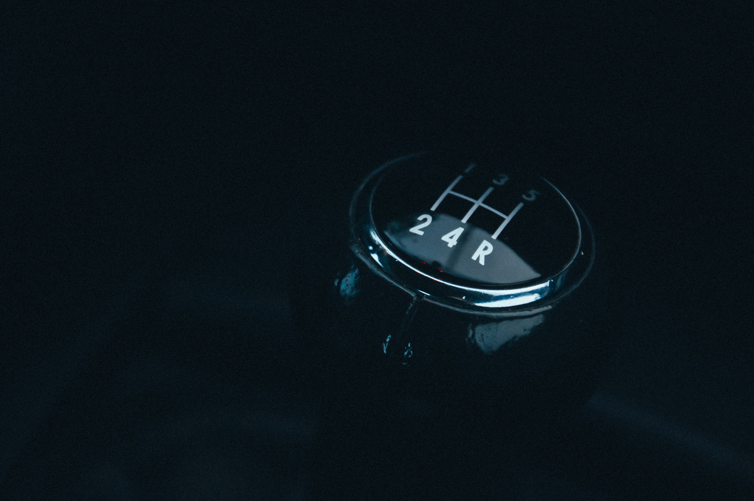 Closeup Photography of Vehicle Gear Shift Lever